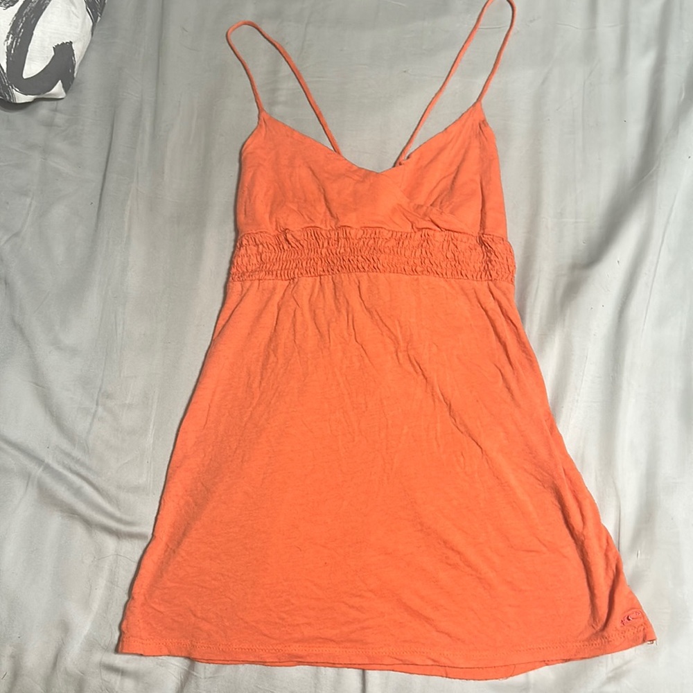 A adjusted O’Neill orange medium tank top